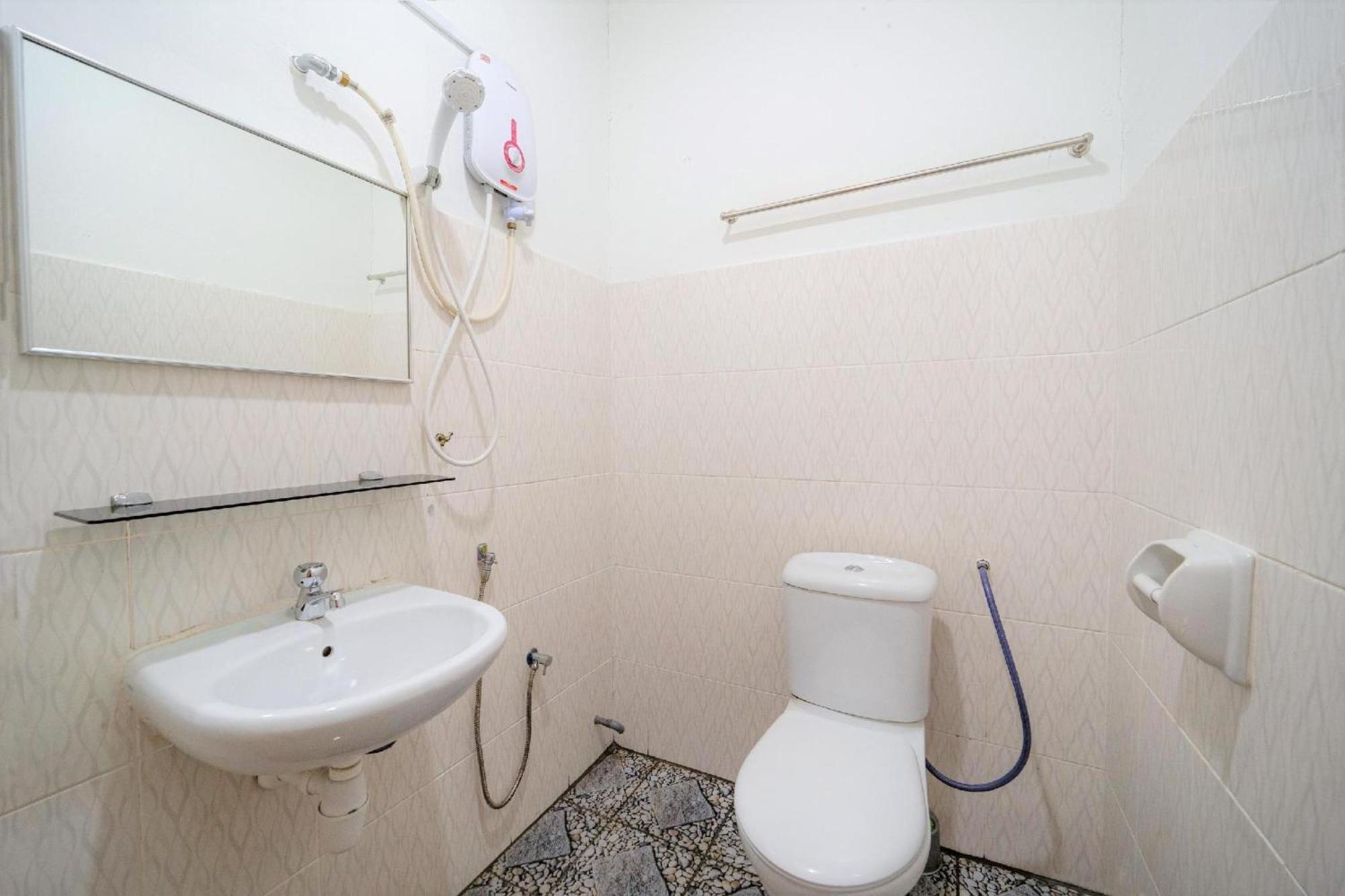 Super Oyo 89807 My Budget Home Batu Feringgi Bagian luar foto