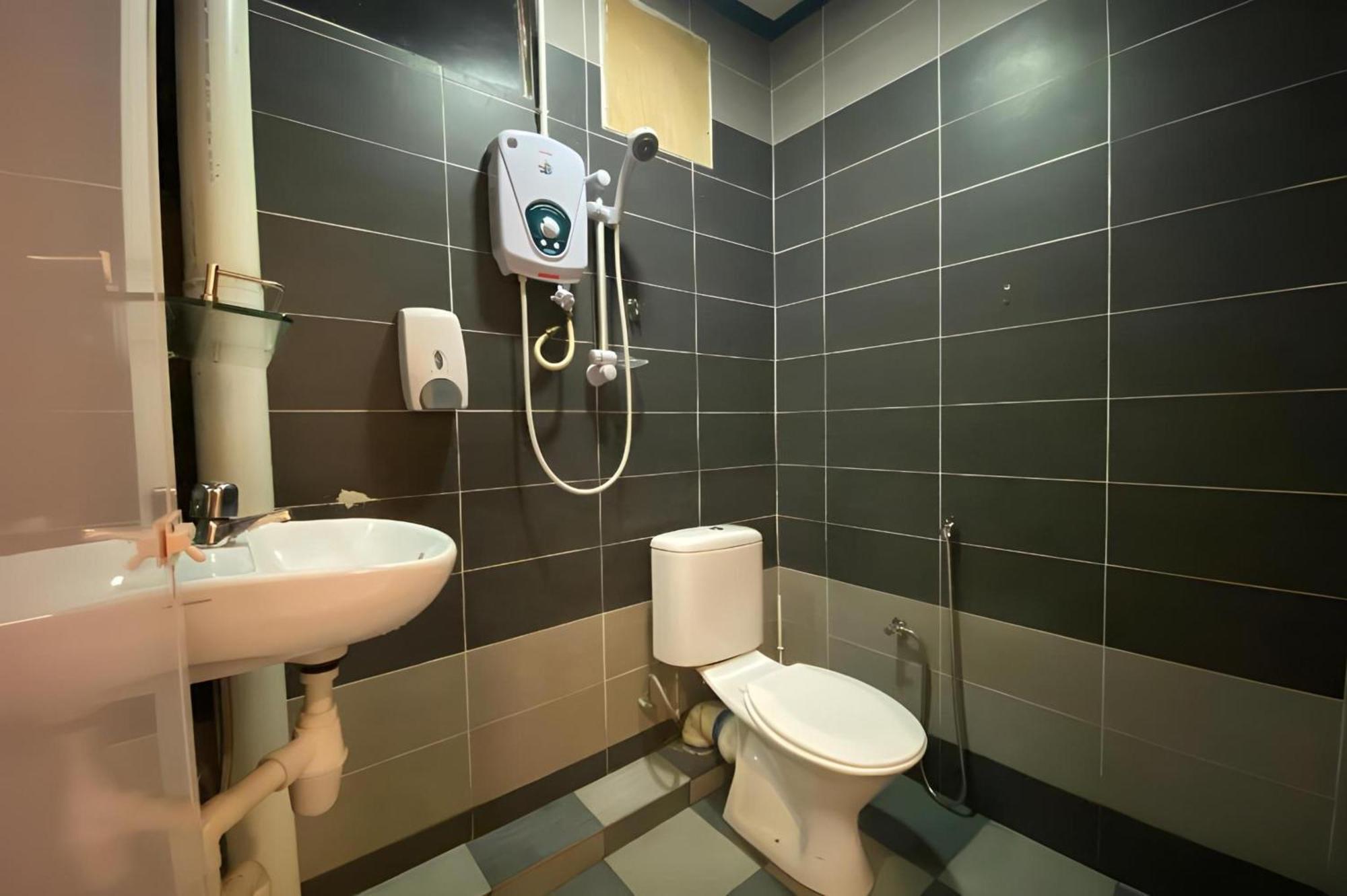 Super Oyo 89807 My Budget Home Batu Feringgi Bagian luar foto