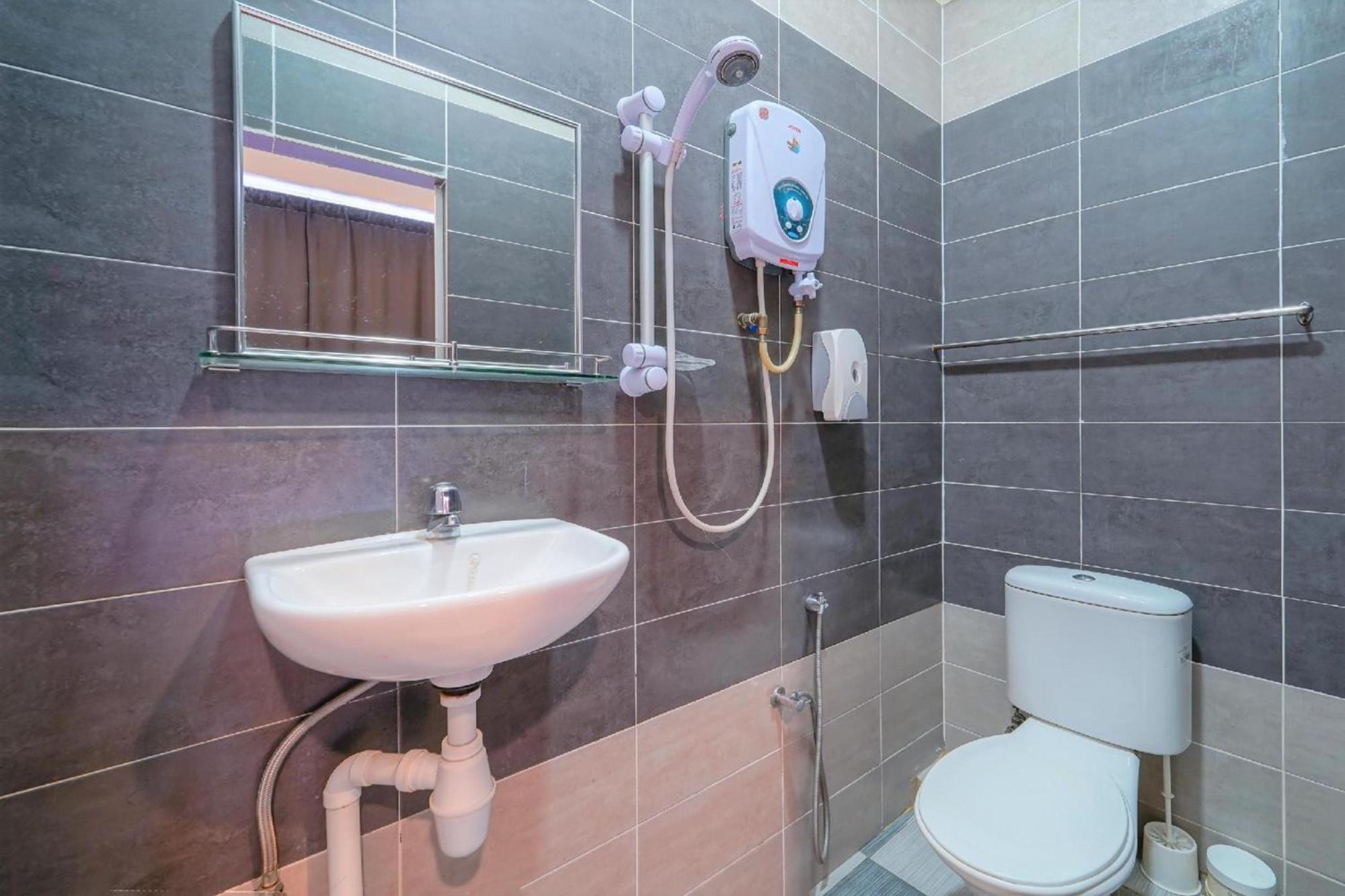 Super Oyo 89807 My Budget Home Batu Feringgi Bagian luar foto